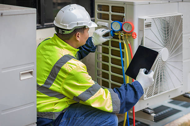 Professional Heat Pump Repair technician working in Stow, OH
